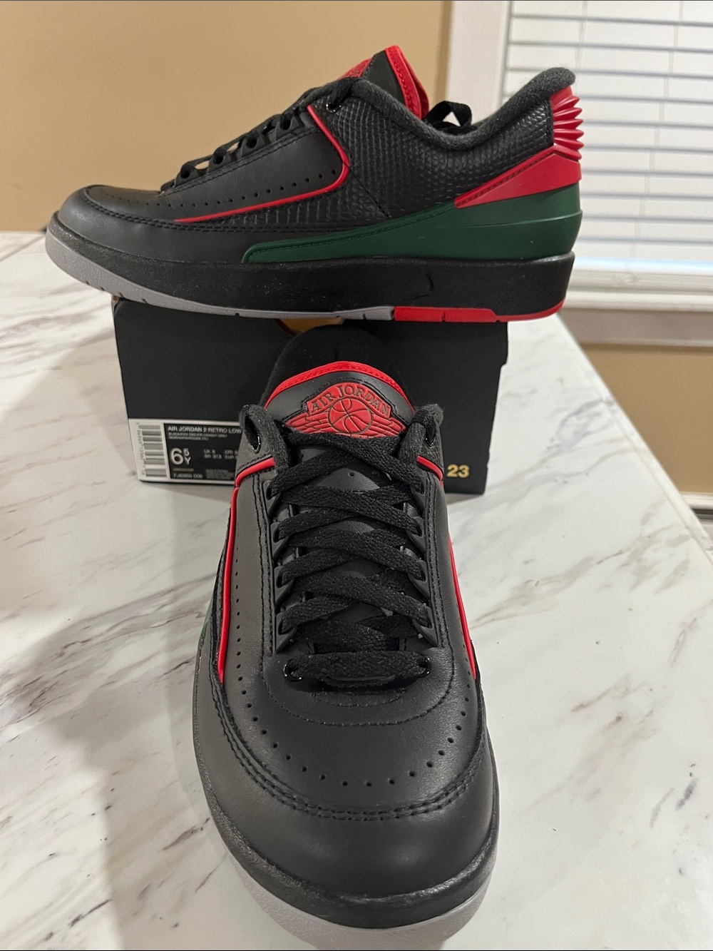 Jordan 2 retrolow - Black with Red & Green Accents